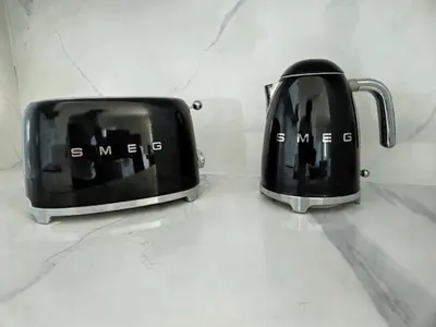 two toasters sitting on top of a counter at Soma Bay - Luxury 3 Bedroom Penthouse - Panoramic Sea View, Free Pool and Beach Access in Hurghada