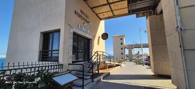 a building with a staircase in front of a store at Susi`s TheView Luxuriöse Ferienwohnung mit fantastischem Meerblick in Hurghada