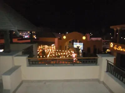a bunch of lights on a balcony at night at ALDAU Heights Mountain View in Hurghada