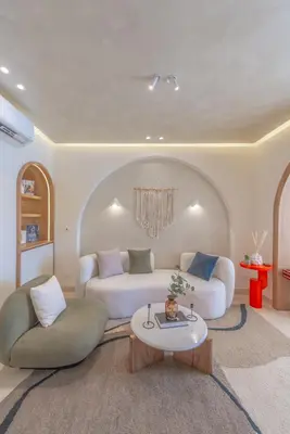 a living room with two couches and a table at Stunning Luxurious 5 BR Villa at West Golf El Gouna in Hurghada
