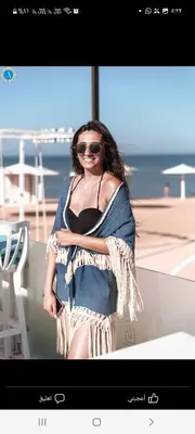 a woman standing on the side of a boat at Selena bay resort in Hurghada