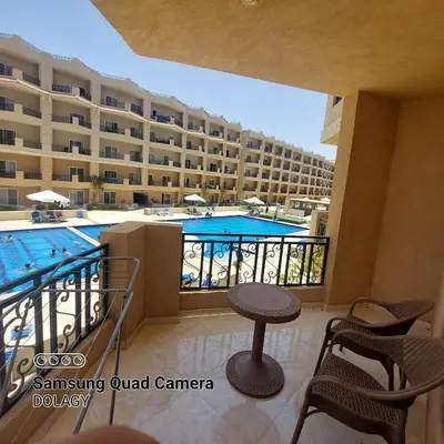 a balcony of a hotel with a swimming pool at Selena bay resort in Hurghada