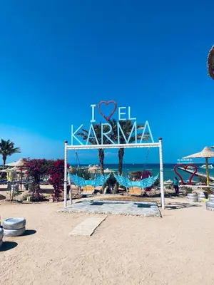 a sign on a beach with the words i love zeal at Apartment in el karma aqua beach resort hurghada near el gouna 2 in Hurghada