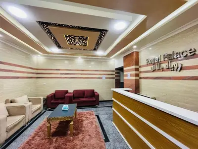 a lobby with a waiting room with red chairs at Rosa Hotel Hurghada in Hurghada