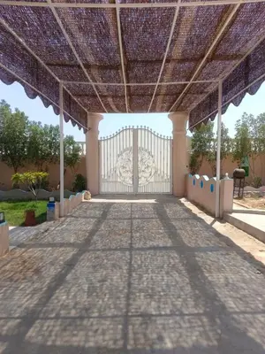 a gate in the middle of a building at ATON PALACE Luxor in Luxor