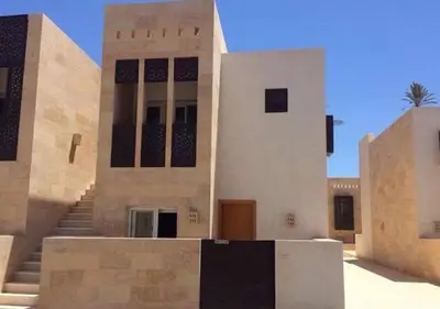 a building with a staircase in front of it at Scarab El Gouna in Hurghada
