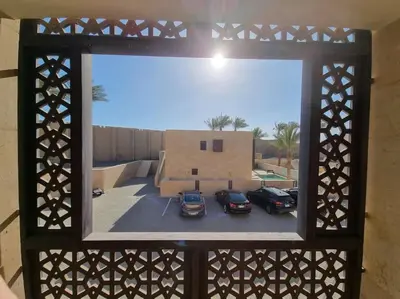 a view of cars parked in a parking lot at EL GOUNA Scarab Club One bedroom in Hurghada