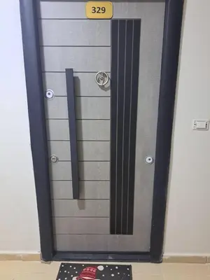 a large metal door with a sign on it at Sea View Beach Access Princess Resort Hurghada in Hurghada
