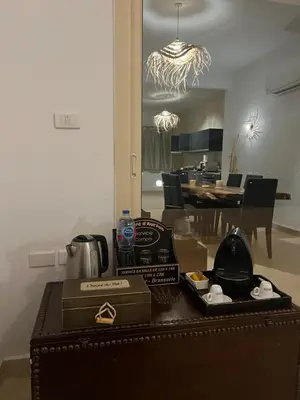 a table with a box of food on top of it at Villa du bonheur 202 in Hurghada