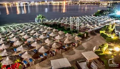 an aerial view of a beach with umbrellas at Salvatore Rooms-All Inclusive Makadi in Hurghada