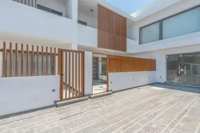 an empty room with sliding glass doors in a house at New & Chic 2BR with Pool Access Sholan 2 El Gouna in Hurghada