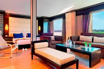 a living room with a couch and a table at Sofia Nile Cruise Luxor & Aswan in Luxor