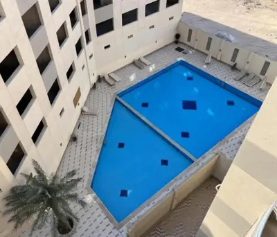 an overhead view of a pool on a building at princess apartments in Hurghada