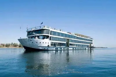 a large cruise ship sitting in the water at Nile Cruise 3 Nights Aswan to Luxor Sightseeing Included in Nag` el-Ramla