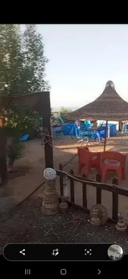 a view of a fence with a table and chairs at Mo Asha in Safaga