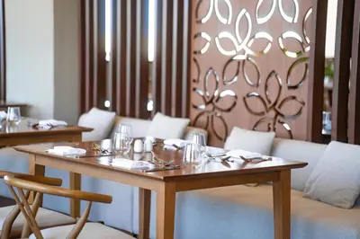 a table with glasses on top of it in a restaurant at Sentido Naga Bay - Adults friendly in Hurghada