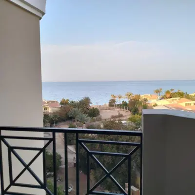 a balcony with a view of the ocean at جوليانا بيتش ريزورت in Hurghada