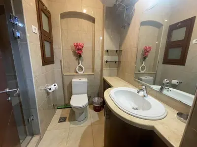 a bathroom with a toilet and a sink at El gouna , Red sea in Hurghada