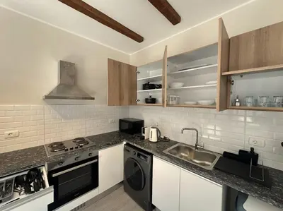 a kitchen with a sink and a dishwasher at Unique 2BR Villa - Private Pool In Bali-ElGouna in El Gouna