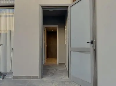 an open door to a hallway in a building at Unique 2BR Villa - Private Pool In Bali-ElGouna in El Gouna