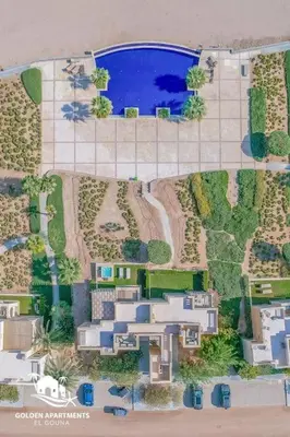 a model of a house with a swimming pool at Gouna Retreat 2BR Apt Waterside Hot Tub & Pool in Hurghada
