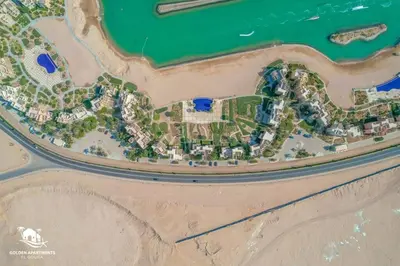 an aerial view of a resort on the beach at Gouna Retreat 2BR Apt Waterside Hot Tub & Pool in Hurghada