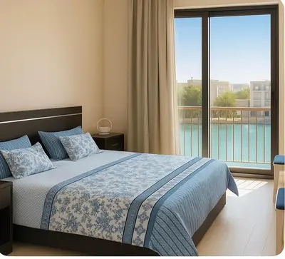 a bedroom with a bed and a large window at lagoon villa in Hurghada