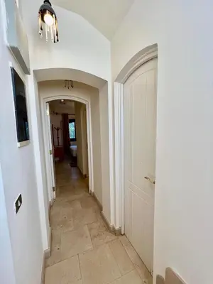 a hallway of a home with a door and a hallwayngth at wast golf y 39-0-2 in Hurghada