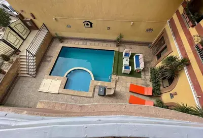 an overhead view of a swimming pool in a house at Golden key in Hurghada