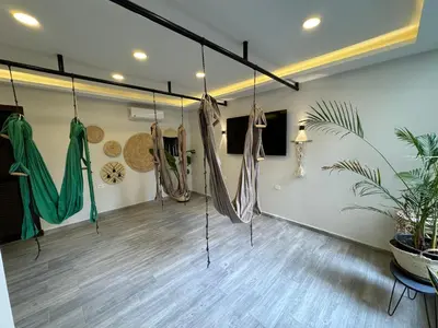 a room with hammocks hanging from the ceiling at Imperial resort Hurgarda in Hurghada