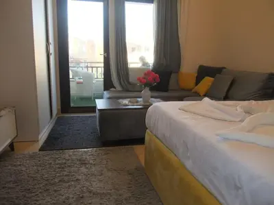 a living room with a bed and a couch at Victoria Aldau Heights Hurghada rent one bedroom Apartment in Hurghada