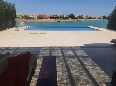 a view of a patio with a swimming pool at Villa, with heated Pool and Lagoon in Hurghada