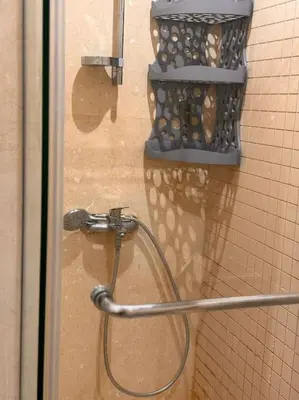a shower in a bathroom with a shower head at Amazing Mangroovy 1 BD in gouna in Hurghada