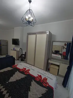 a room with a bed with a box on it at Juliana beach in Hurghada