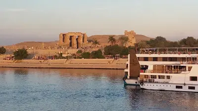 a boat in the water with a castle in the background at Nile Cruise 2 nights 3 Days From Aswan to Luxor with tours in Aswan