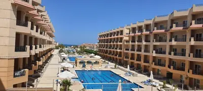 an aerial view of a hotel with a swimming pool at Studio in Selena Bay Hurghada in Hurghada