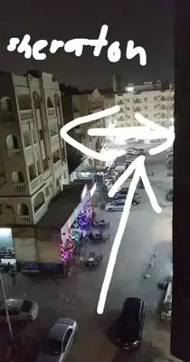 a view of a parking lot with parked cars at Sheraton Plaza house near the beaches and near New Marina studio 428 in Hurghada