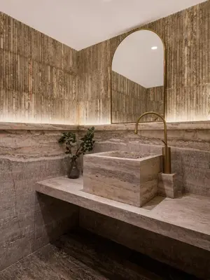 a bathroom with a stone sink and a mirror at Soleil Nile Cruise - Every Monday from Luxor for 4 & 7 Nights, and every Friday from Aswan for 3 & 7 Nights in Luxor