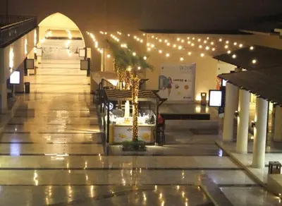 a building with lights and stairs in a mall at Diamond Lily Aldau heights Hurghada rent one bedroom apartment in Hurghada