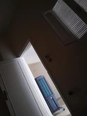 a white refrigerator with a blue object in it at Florence el khameseny in Sahl Hasheesh