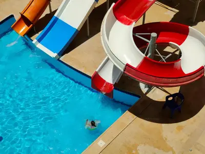 an image of a person in the water on a water slide at جوليانا سما جروب in Hurghada