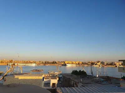 a view of a harbor with boats in the water at Villa Omar El Sharif Studio n1 in Luxor