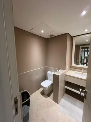 a bathroom with a toilet and a sink at Modern Apartment Abutig Marina in Hurghada