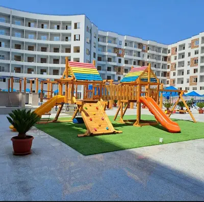 a playground with a slide and a slideintend at Tiba gollden resort in Hurghada