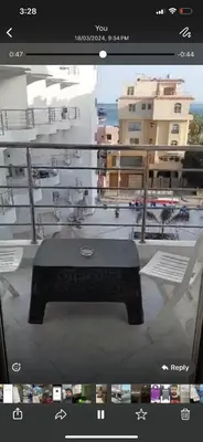 a computer screen with a keyboard and a view of a building at Diamond resort compound in Hurghada