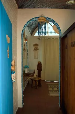 an entrance to a room with a blue archway at Dolty Kato Nubian House By Kato Dool in Aswan