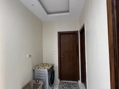 a room with a door and a tv in a room at Dream apartment1 in Hurghada