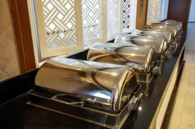 a row of silver drums lined up in a row at Orient Sun Times Nile Cruise-Every Monday from Luxor for 04 & 07 Nights - Every Friday From Aswan for 03 Nights in Luxor