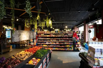 a grocery store filled with lots of fruits and vegetables at Al Dora Residence Apartments in Hurghada
