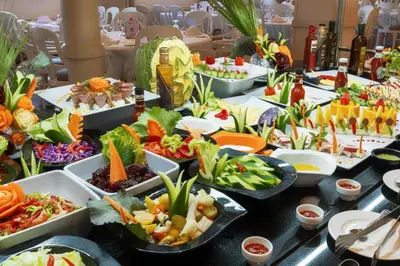 a buffet with many plates of food on a table at Orient Grand Rose Nile Cruise - Every Saturday from Luxor for 07 & 04 Nights - Every Wednesday From Aswan for 03 Nights in Luxor